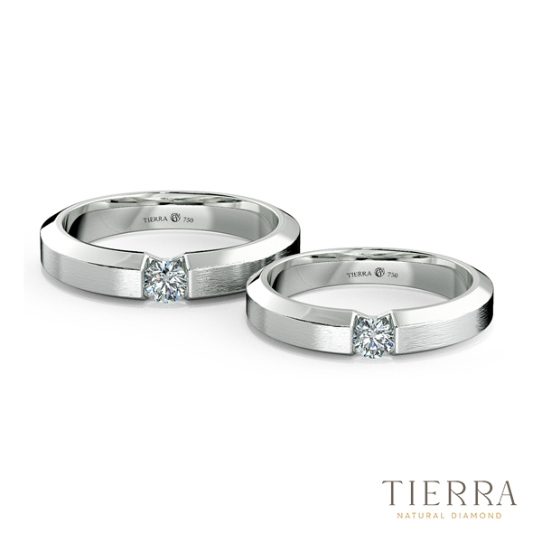 Nhẫn kim cương đính một viên kim cương chủ đơn giản nhưng vẫn thanh lịch